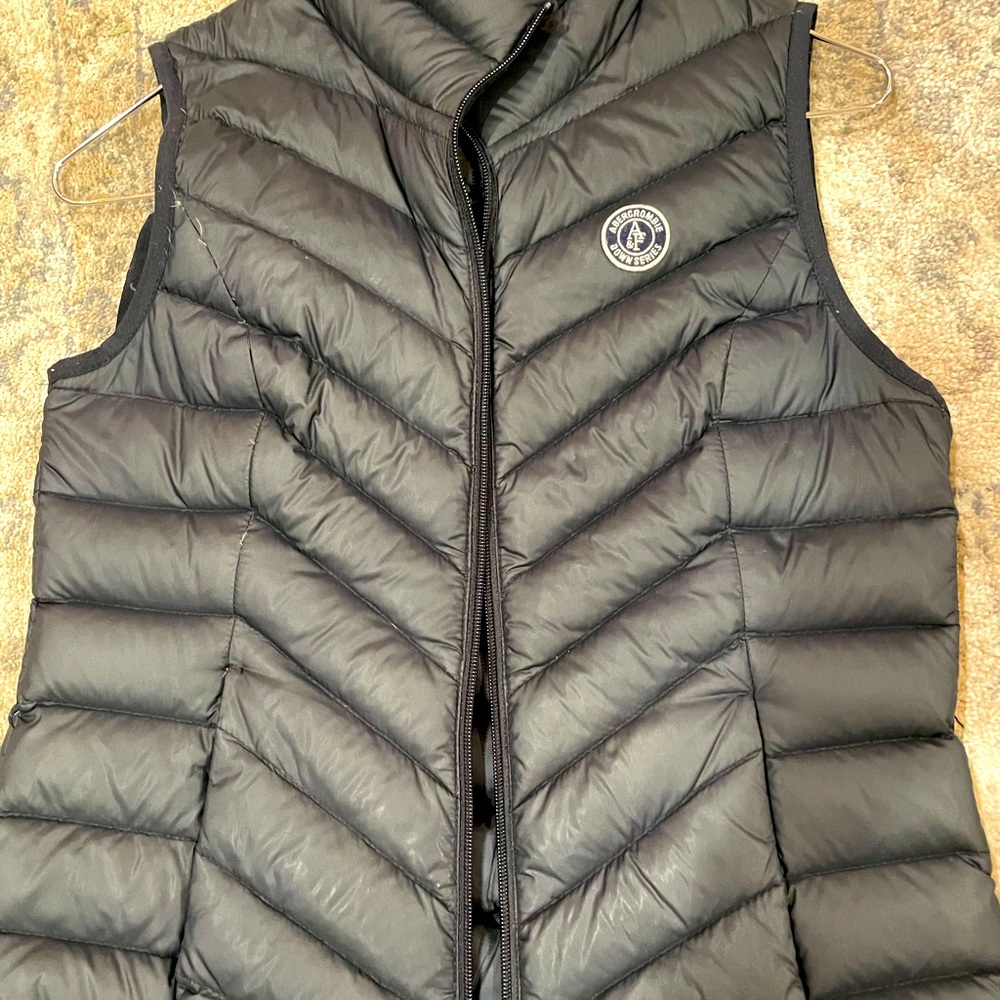 This is a classic Abercrombie and Fitch vest. Color is navy blue